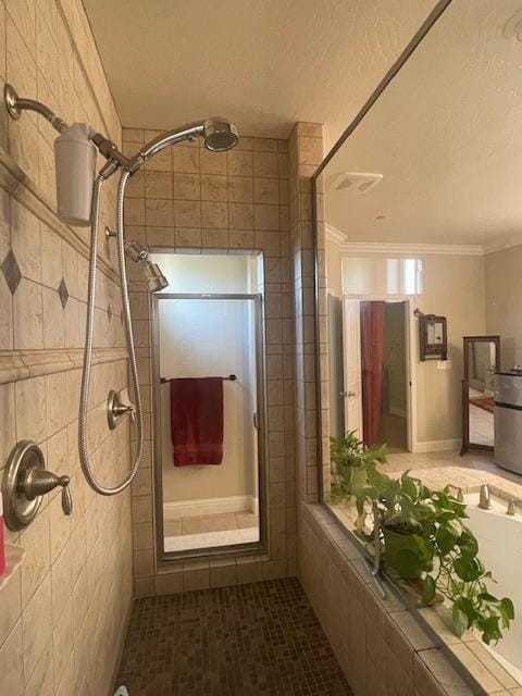 2291 E Prestwick Ave, Fresno, CA 93730 - full bath with a tile shower, crown molding, and tile patterned floors