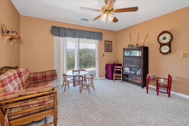 39397 Moonray Ln, Oakhurst, CA 93644 - carpeted living room with ceiling fan and baseboards