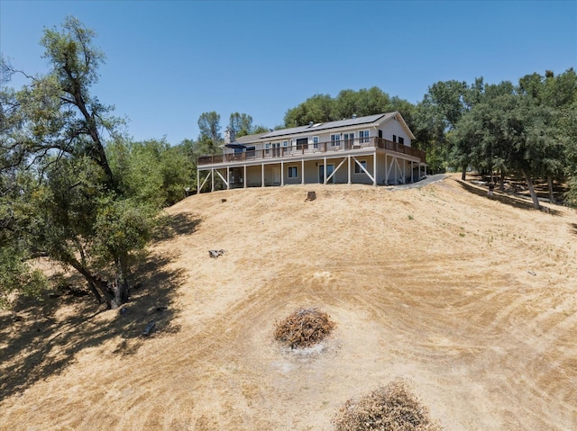 39397 Moonray Ln, Oakhurst, CA 93644 - back of house with a deck