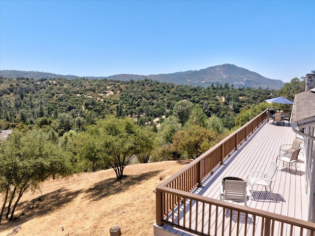 39397 Moonray Ln, Oakhurst, CA 93644 - view of mountain backdrop with a heavily wooded area