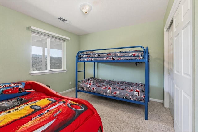39397 Moonray Ln, Oakhurst, CA 93644 - carpeted bedroom with a closet and baseboards