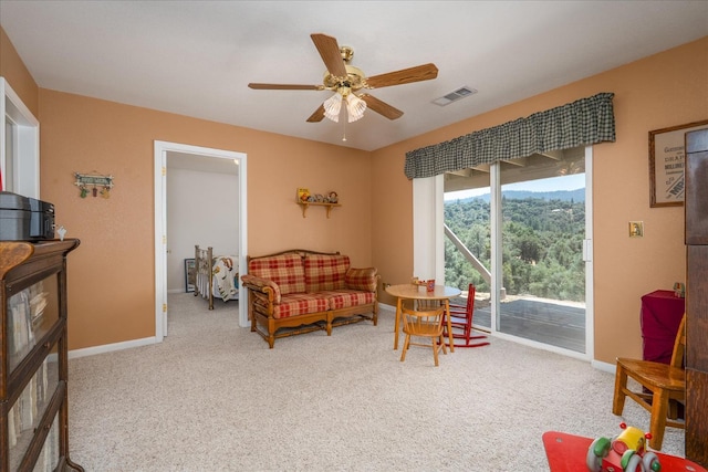 39397 Moonray Ln, Oakhurst, CA 93644 - sitting room with a ceiling fan and carpet floors