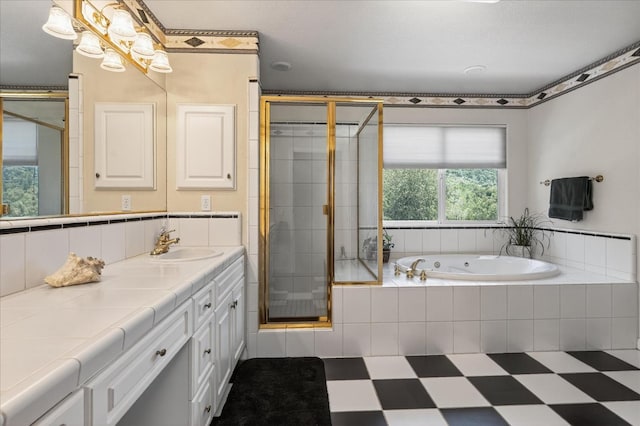 39397 Moonray Ln, Oakhurst, CA 93644 - bathroom featuring vanity, a shower stall, a bath, and tile patterned floors