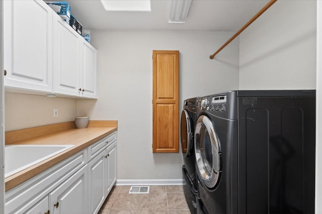 39397 Moonray Ln, Oakhurst, CA 93644 - washroom featuring cabinet space and independent washer and dryer