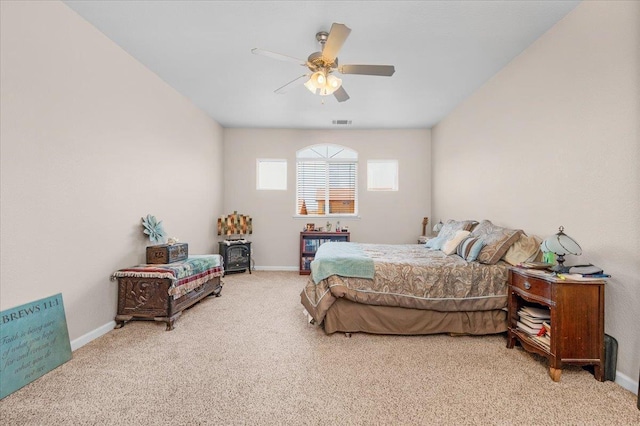 6164 W Keats, Fresno, CA 93723 - bedroom featuring carpet floors, ceiling fan, and a wood stove