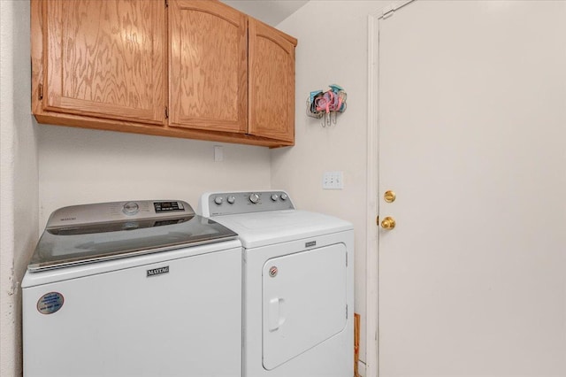 6164 W Keats, Fresno, CA 93723 - laundry area featuring independent washer and dryer and cabinet space