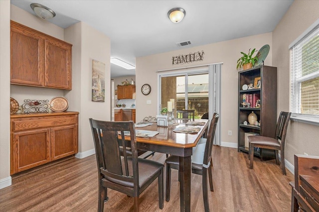 6164 W Keats, Fresno, CA 93723 - dining area with wood finished floors and baseboards