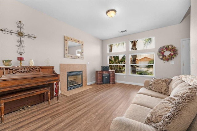 6164 W Keats, Fresno, CA 93723 - living area with wood finished floors and a fireplace