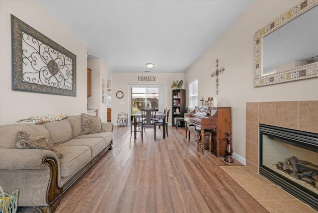 6164 W Keats, Fresno, CA 93723 - living room with a fireplace and wood finished floors