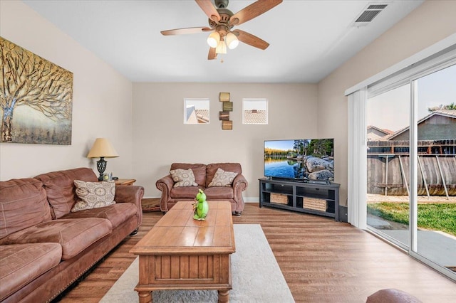 6164 W Keats, Fresno, CA 93723 - living area featuring wood finished floors and a ceiling fan