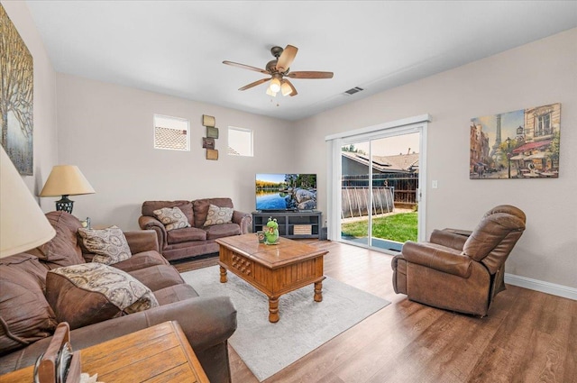 6164 W Keats, Fresno, CA 93723 - living area featuring wood finished floors and ceiling fan