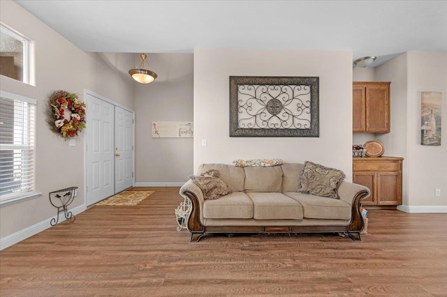 6164 W Keats, Fresno, CA 93723 - living area featuring light wood finished floors and plenty of natural light