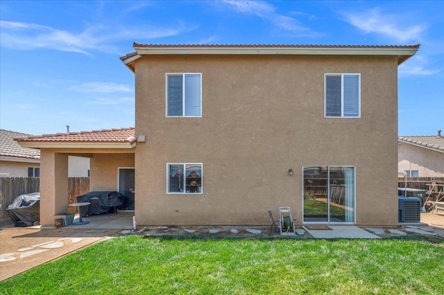 6164 W Keats, Fresno, CA 93723 - back of property featuring stucco siding, a patio area, and a tiled roof
