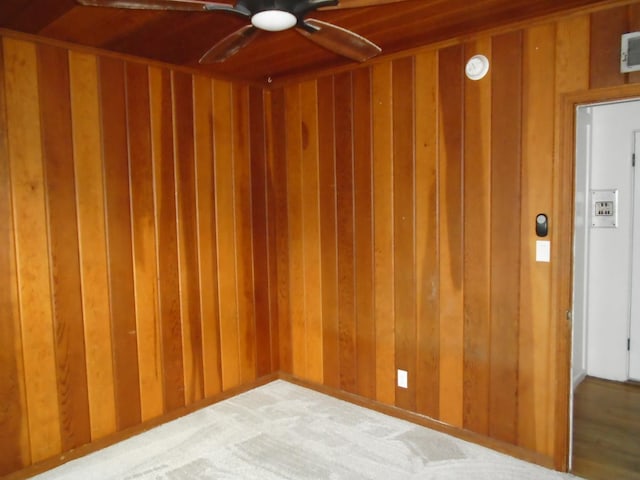 935 S Park Circle Dr, Fresno, CA 93727 - spare room featuring a ceiling fan and wooden walls