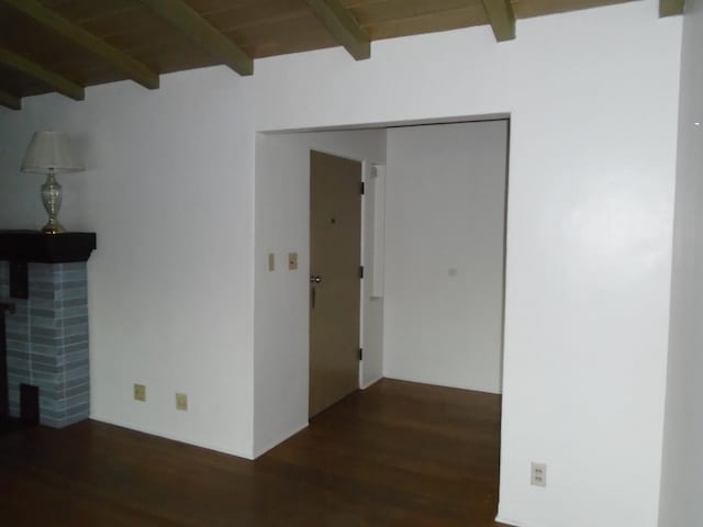 935 S Park Circle Dr, Fresno, CA 93727 - spare room with beam ceiling and wood finished floors
