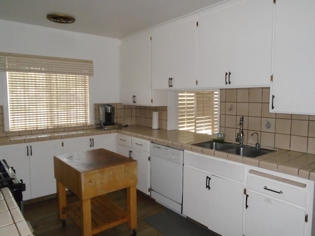935 S Park Circle Dr, Fresno, CA 93727 - kitchen with white dishwasher, white cabinetry, decorative backsplash, tile countertops, and range