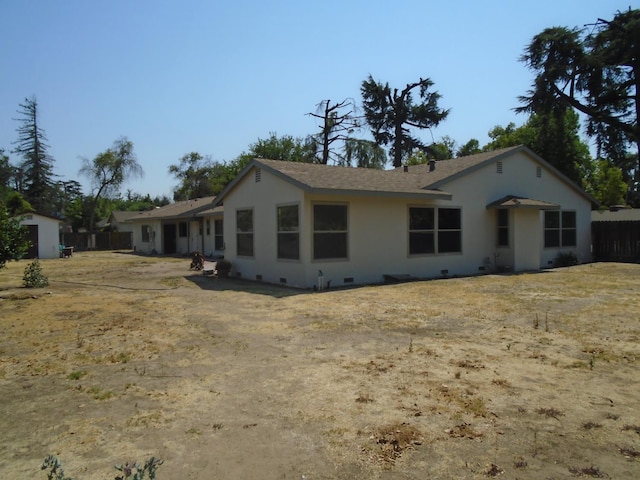 935 S Park Circle Dr, Fresno, CA 93727 - rear view of house featuring stucco siding