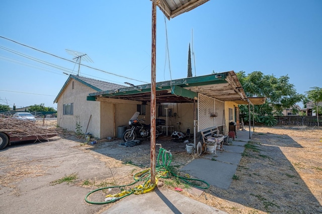25 W Dinuba Ave, Fresno, CA 93706 - back of house featuring stucco siding