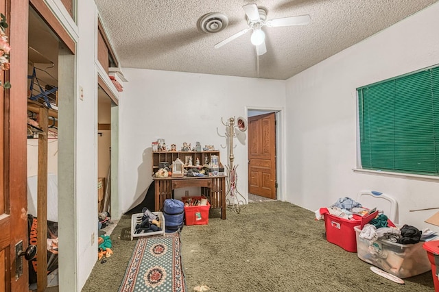 25 W Dinuba Ave, Fresno, CA 93706 - carpeted bedroom with a textured ceiling and ceiling fan