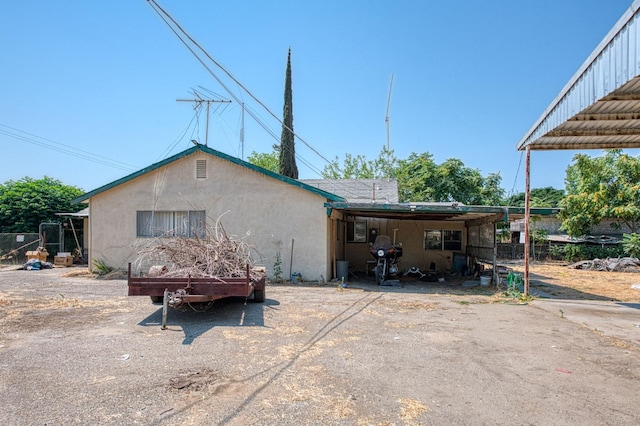 25 W Dinuba Ave, Fresno, CA 93706 - back of house featuring stucco siding