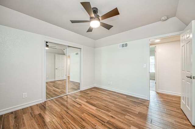 591 E Warwick Ave, Fresno, CA 93720 - unfurnished bedroom with wood finished floors, a closet, and a ceiling fan