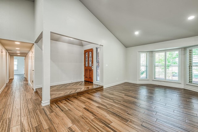 591 E Warwick Ave, Fresno, CA 93720 - entrance foyer featuring high vaulted ceiling, wood finished floors, and recessed lighting