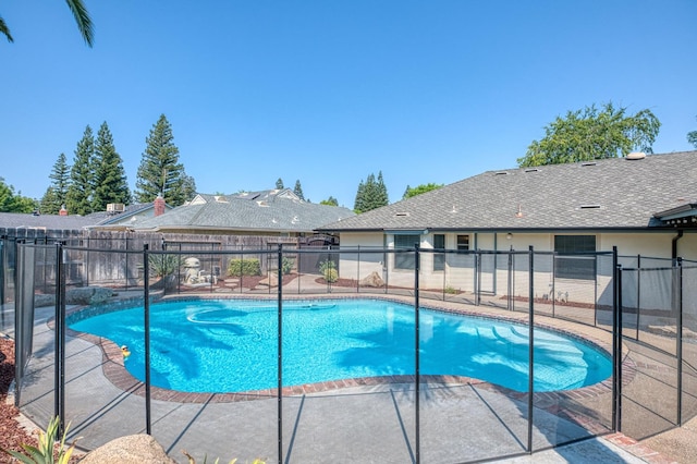591 E Warwick Ave, Fresno, CA 93720 - view of swimming pool featuring a fenced backyard and a patio