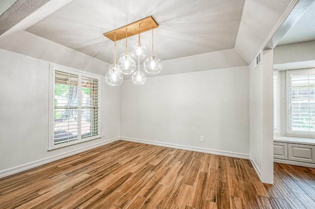 591 E Warwick Ave, Fresno, CA 93720 - unfurnished room with wood finished floors and baseboards