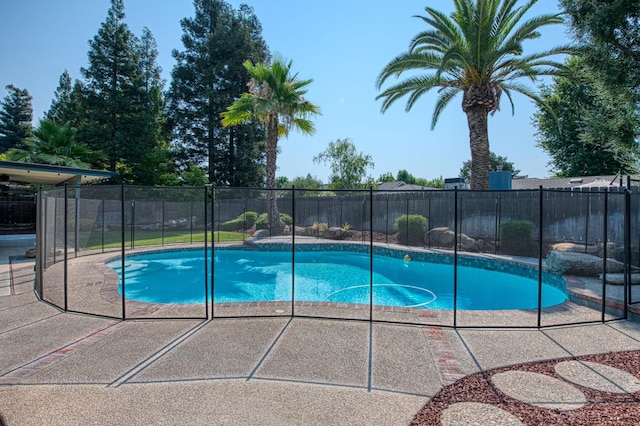 591 E Warwick Ave, Fresno, CA 93720 - view of swimming pool with a patio area