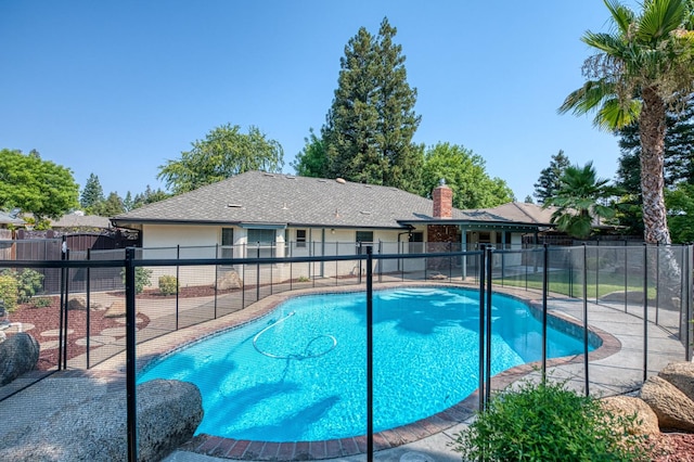 591 E Warwick Ave, Fresno, CA 93720 - view of swimming pool featuring a patio area