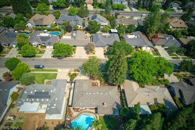 591 E Warwick Ave, Fresno, CA 93720 - aerial overview of property's location with nearby suburban area and a pool area