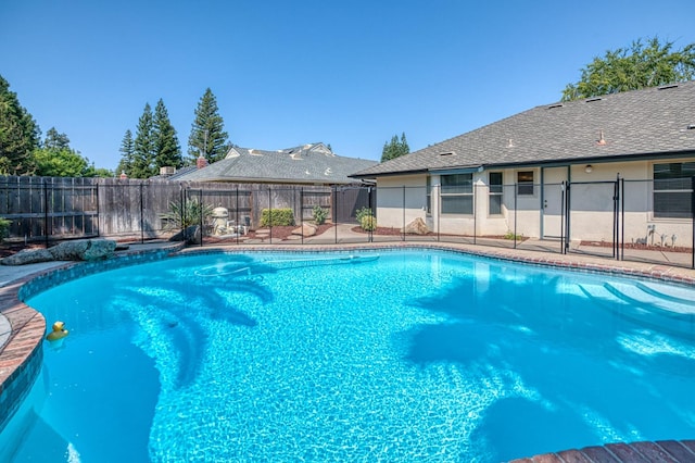 591 E Warwick Ave, Fresno, CA 93720 - view of pool featuring a fenced backyard