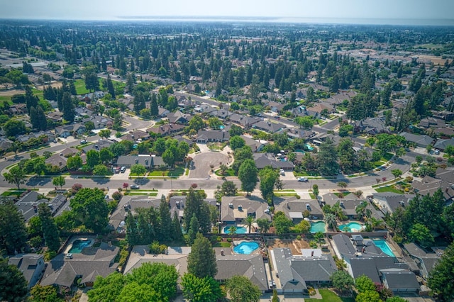 591 E Warwick Ave, Fresno, CA 93720 - aerial view of property and surrounding area featuring nearby suburban area
