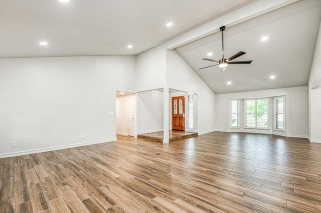 591 E Warwick Ave, Fresno, CA 93720 - unfurnished living room featuring ceiling fan, high vaulted ceiling, wood finished floors, and recessed lighting