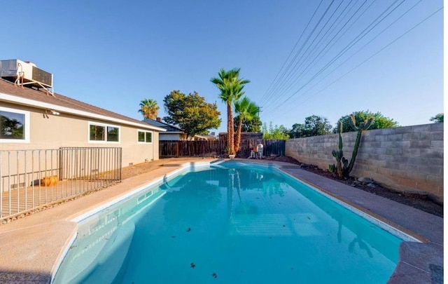 6236 N Bond St, Fresno, CA 93710 - view of pool with a fenced backyard