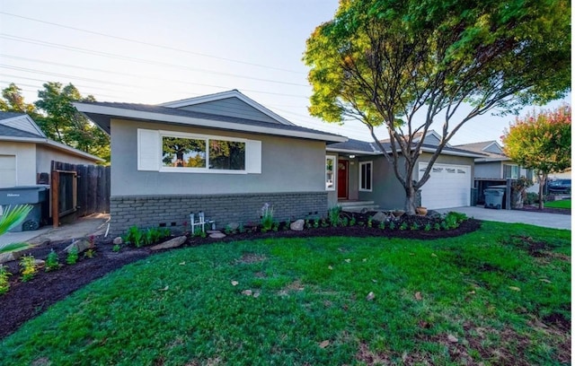 6236 N Bond St, Fresno, CA 93710 - view of front of house with brick siding, a garage, driveway, and stucco siding