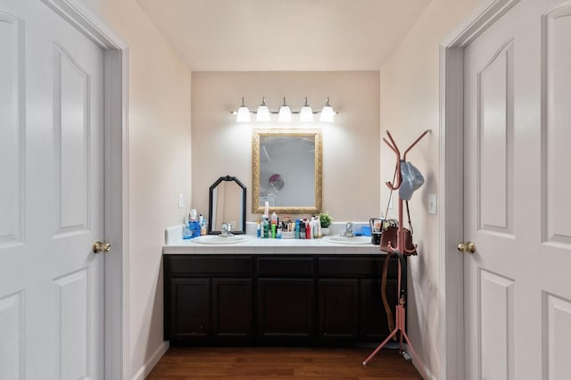 539 Chablis Ave, Madera, CA 93637 - full bathroom with double vanity and wood finished floors