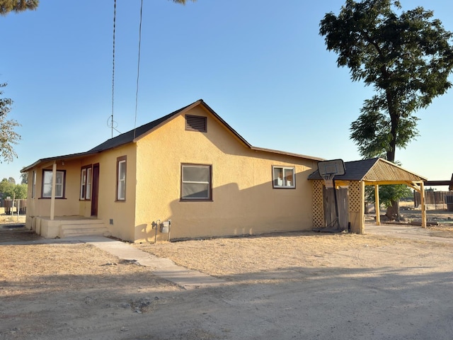 1741 N Blythe Ave, Fresno, CA 93722 - view of front of home with stucco siding