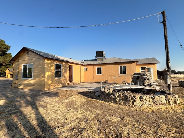 1741 N Blythe Ave, Fresno, CA 93722 - back of property featuring a patio and roof with shingles