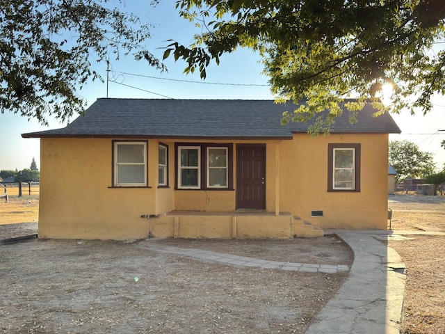 1741 N Blythe Ave, Fresno, CA 93722 - bungalow featuring a shingled roof, crawl space, and stucco siding