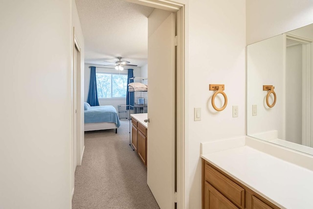 31736 Apache Rd, Coarsegold, CA 93614 - ensuite bathroom with vanity and a ceiling fan