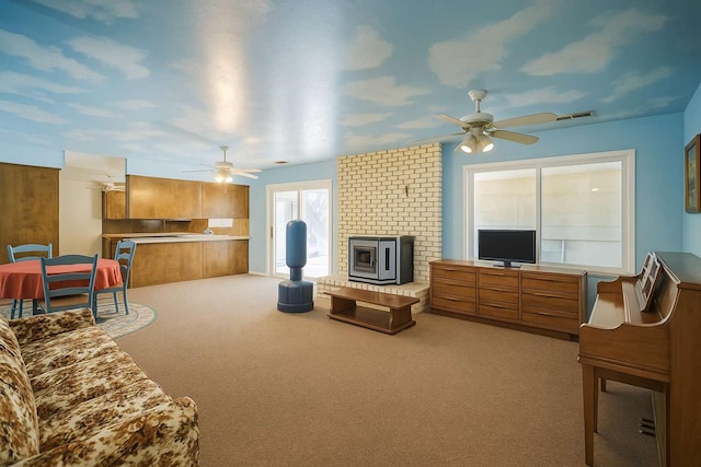 31736 Apache Rd, Coarsegold, CA 93614 - living area with a ceiling fan, carpet, and a brick fireplace