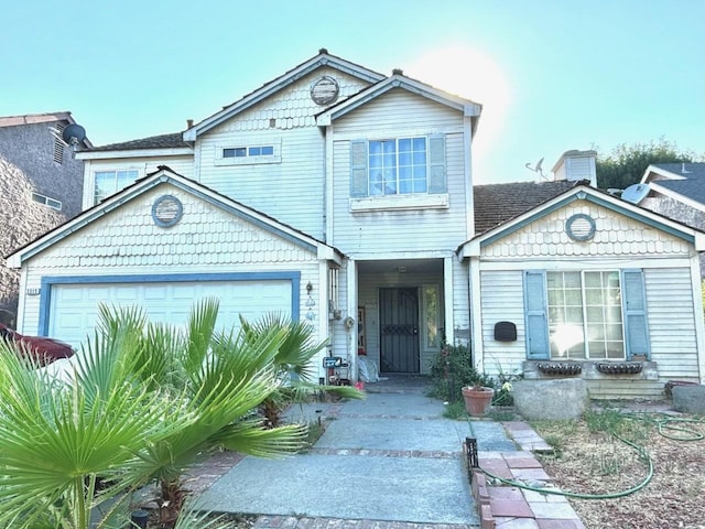 3315 Dewey Ave, Fresno, CA 93722 - view of front facade featuring an attached garage