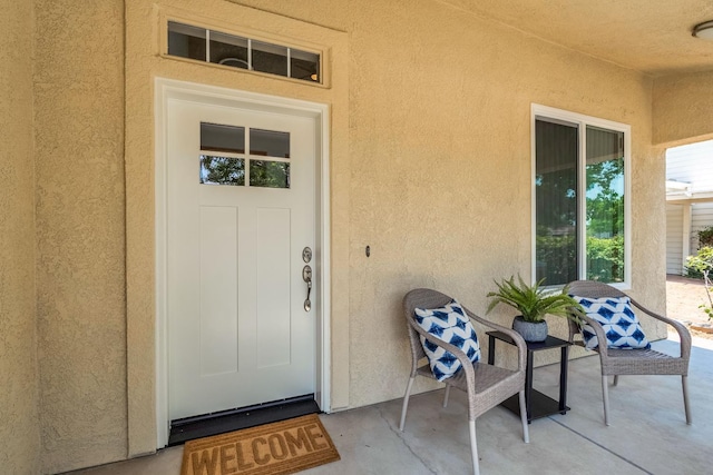 2234 E Serena Ave, Fresno, CA 93720 - doorway to property featuring stucco siding