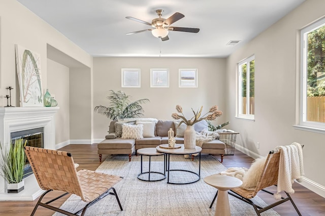 2234 E Serena Ave, Fresno, CA 93720 - living room with healthy amount of natural light, a ceiling fan, and wood finished floors
