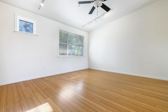 2658 E Alluvial Ave Unit 220, Fresno, CA 93720 - unfurnished room with rail lighting, a ceiling fan, and light wood finished floors