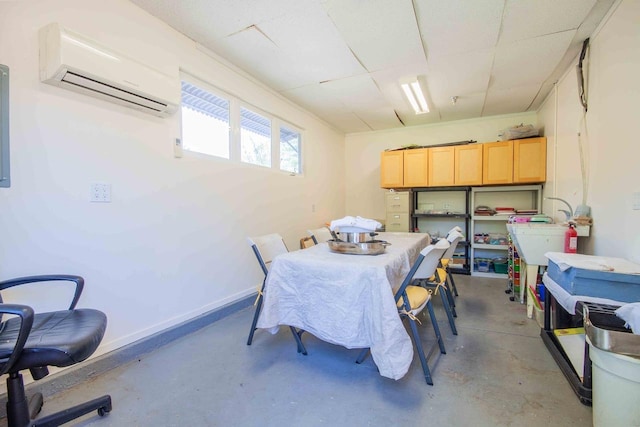 2658 E Alluvial Ave Unit 220, Fresno, CA 93720 - dining space with a wall mounted AC and concrete floors