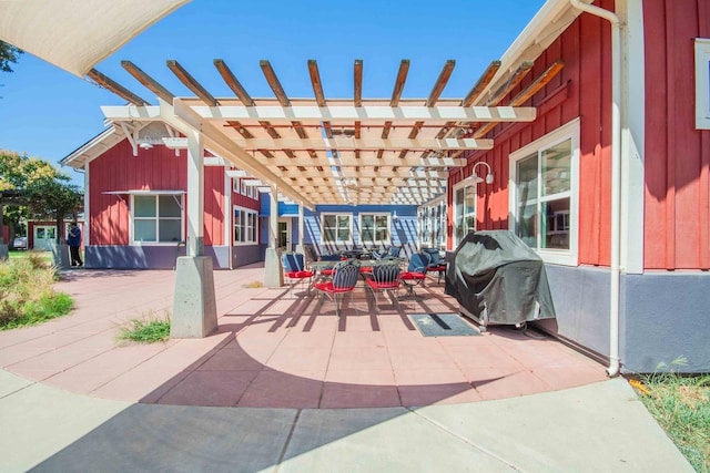2658 E Alluvial Ave Unit 220, Fresno, CA 93720 - view of patio with a pergola, area for grilling, and outdoor dining area