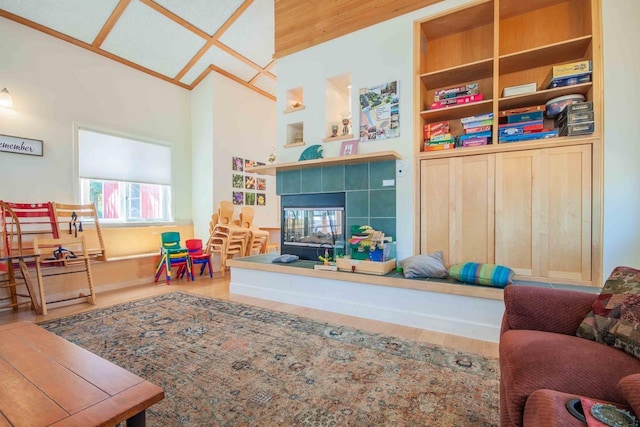 2658 E Alluvial Ave Unit 220, Fresno, CA 93720 - living room with wood finished floors and a tiled fireplace