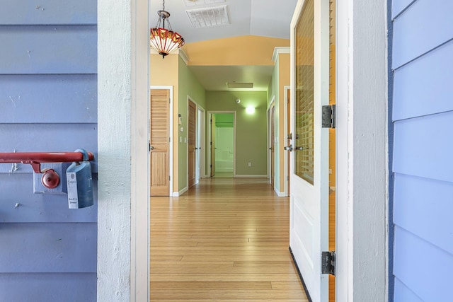 2658 E Alluvial Ave Unit 220, Fresno, CA 93720 - hallway featuring wood finished floors and vaulted ceiling